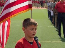 Emotional impact: 10-year-old wows with national anthem, brings tears to grown men