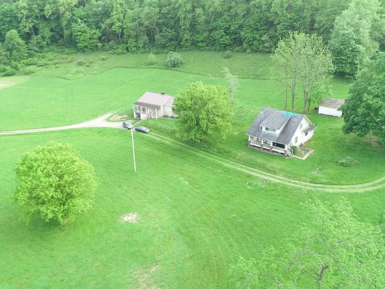 42 Acres with Two Homes and Timber
