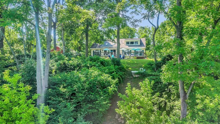 Secluded 4‑Bed Lakefront Retreat on 5 Wooded Acres with Stream & High‑End Utilities