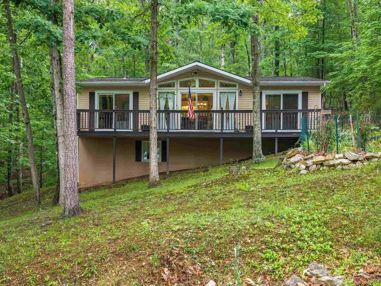 Classic Raised Ranch Mountain Getaway – Spacious, Versatile & Full of Potential!
