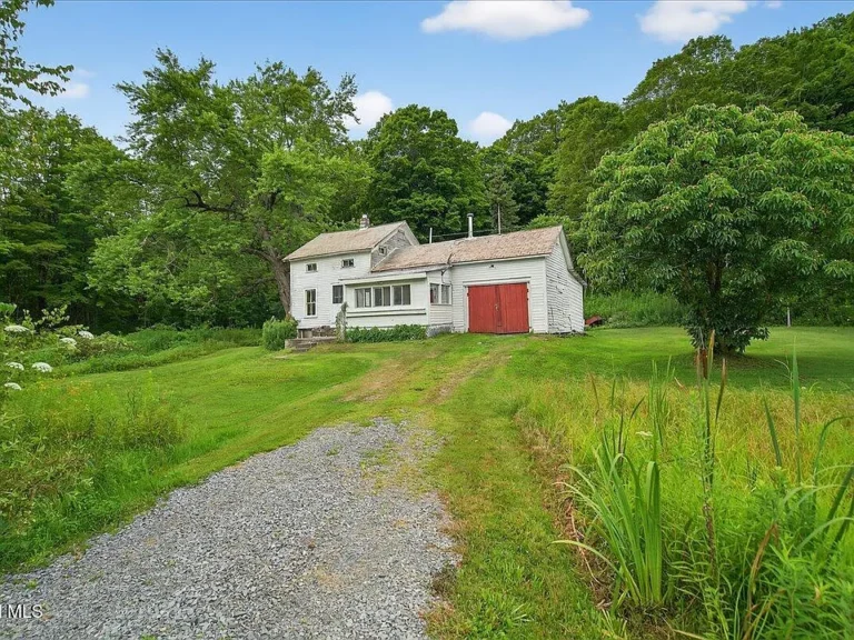 Welcome to this charming circa 1880 Saltbox-style home