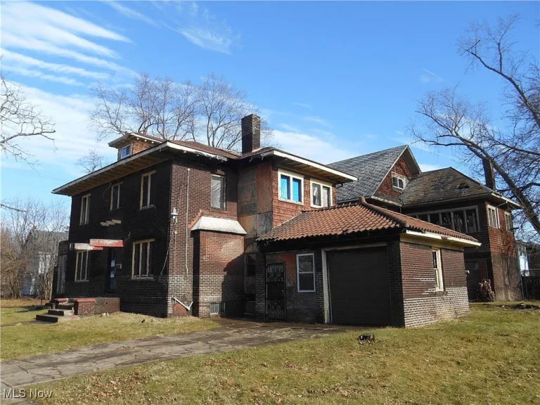 Priced at just $55,000, this expansive six-bedroom brick home at 1683 Juanita Avenue