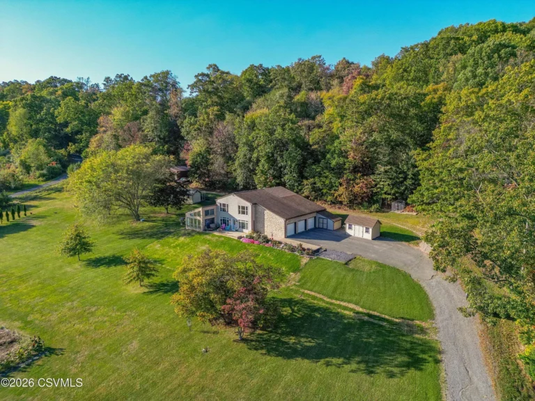 Secluded 16-Acre Property with Spacious Home Headed to Auction in Irish Valley – $100,000