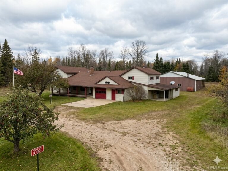 31 Acres of Privacy and Adventure: Spacious 4-Bedroom Retreat with Pond, Pole Barn, and Trail Access – $150,000