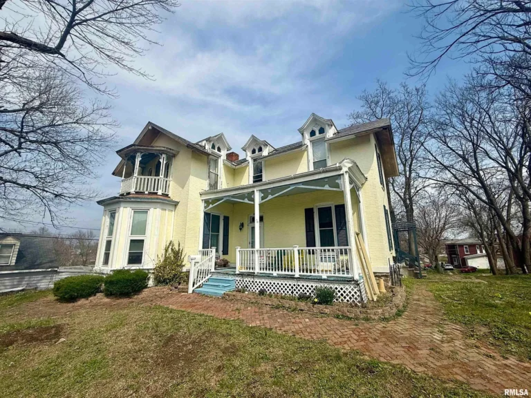 A Timeless 1876 Mini Mansion with Modern Upgrades and Endless Potential – $73,500