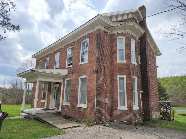 A Timeless Brick Farmhouse on 8+ Acres: Opportunity, Character, and Country Living – $139,900