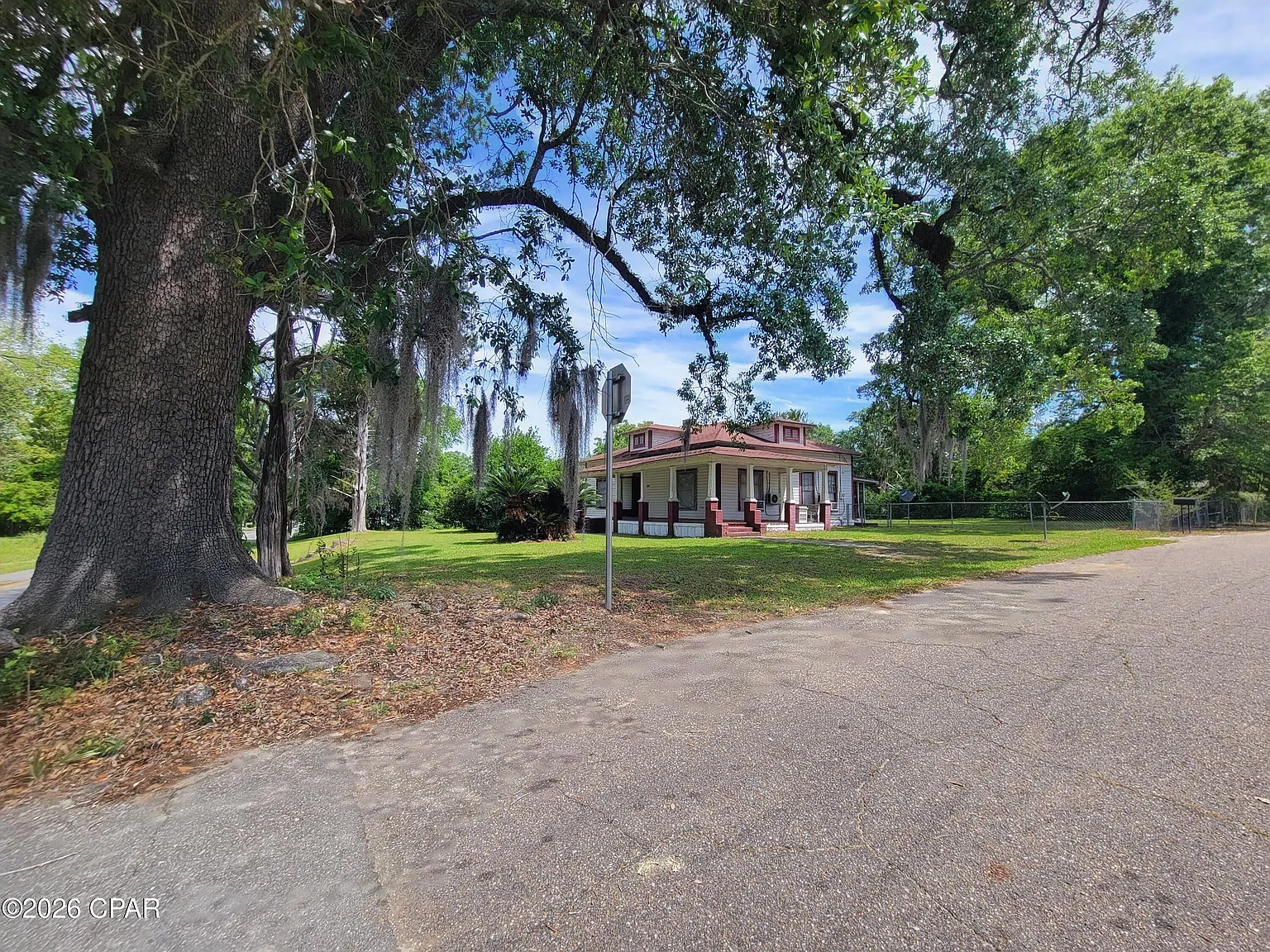 Timeless 1910 Southern Charm on 1+ Acre Corner Lot – Only $90K