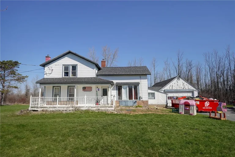Endless Potential on 9.5 Acres: A Historic Farmhouse Retreat in Hilton, NY – $179,900