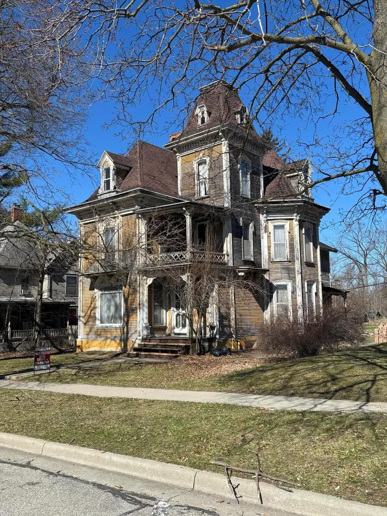 Step Back in Time: A Historic 1885 Manchester Home Full of Charm and Potential – $229,900