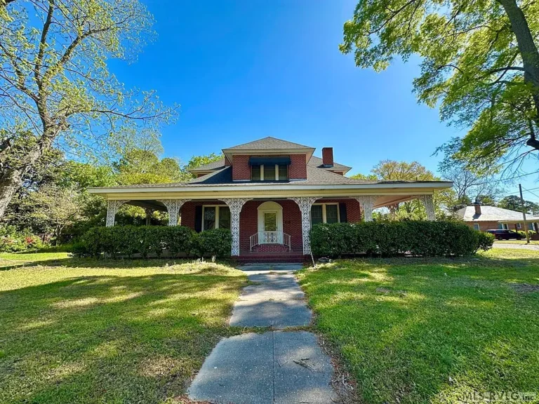 Timeless 1917 Brick Beauty with Historic Charm & Endless Potential – $150,000