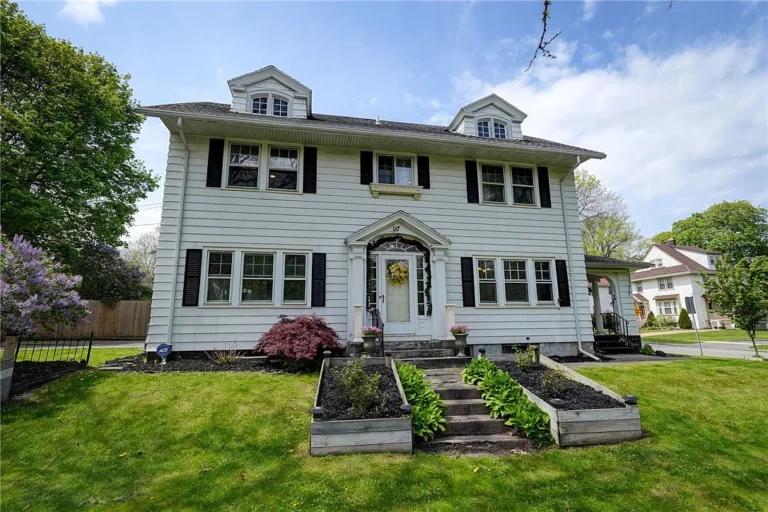 Timeless Colonial Revival Charm Meets Modern Comfort Along Rochester’s Scenic Riverway – $194,900