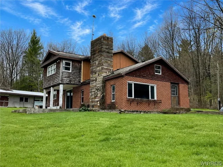 Country Freedom on 15 Acres: A Peaceful Belfast Retreat with Endless Potential – $116,000