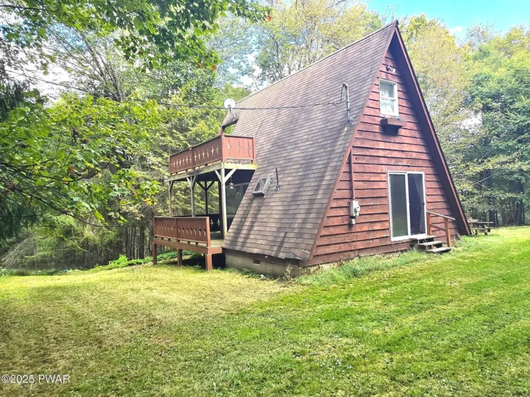 Charming 2-Bedroom Woodland Retreat on 3+ Acres Near a Private Trout Lake – Endless Potential in Pleasant Mount, Pennsylvania – $149,000