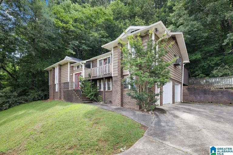 Breathtaking City Views and Endless Potential – Spacious 4-Bedroom Home in Birmingham for $155,000
