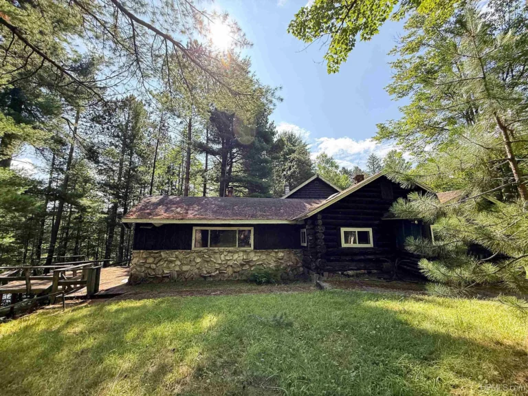 Secluded Log Cabin on 10.5 Acres with Lake Frontage, Stone Fireplace, Sauna & Endless Northwoods Charm – $160,000