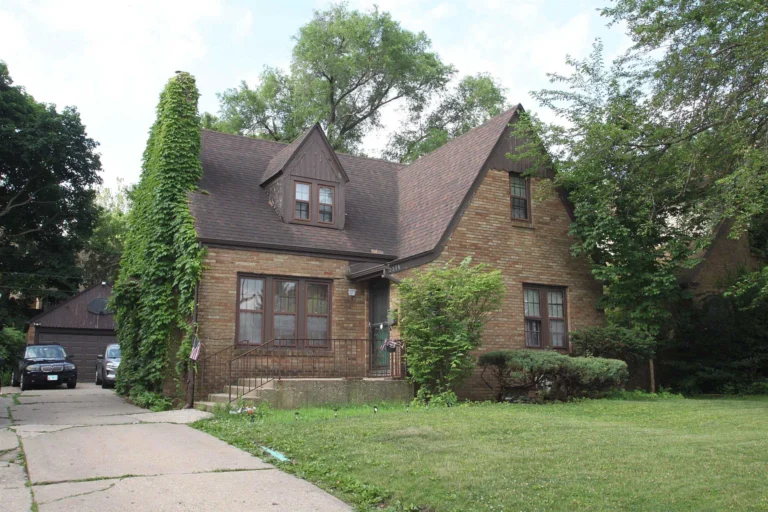 Charming Brick Two-Story Home with Spacious Living, Fenced Yard, and Great Value in Rockford, Illinois – $155,000